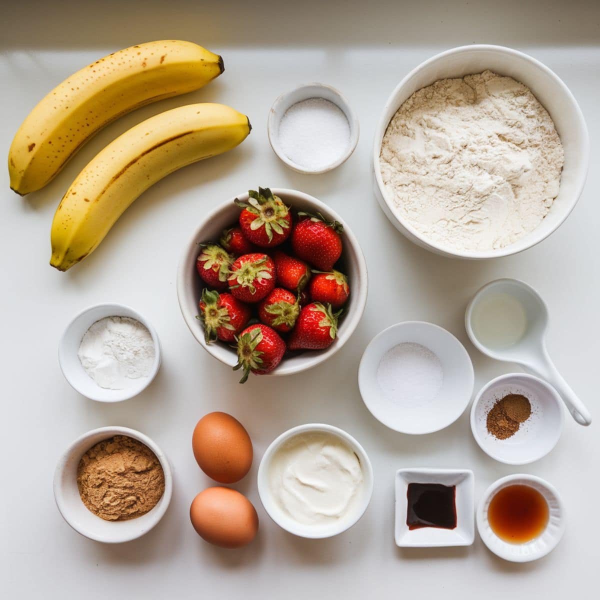 Ingredients for homemade strawberry banana bread muffins	