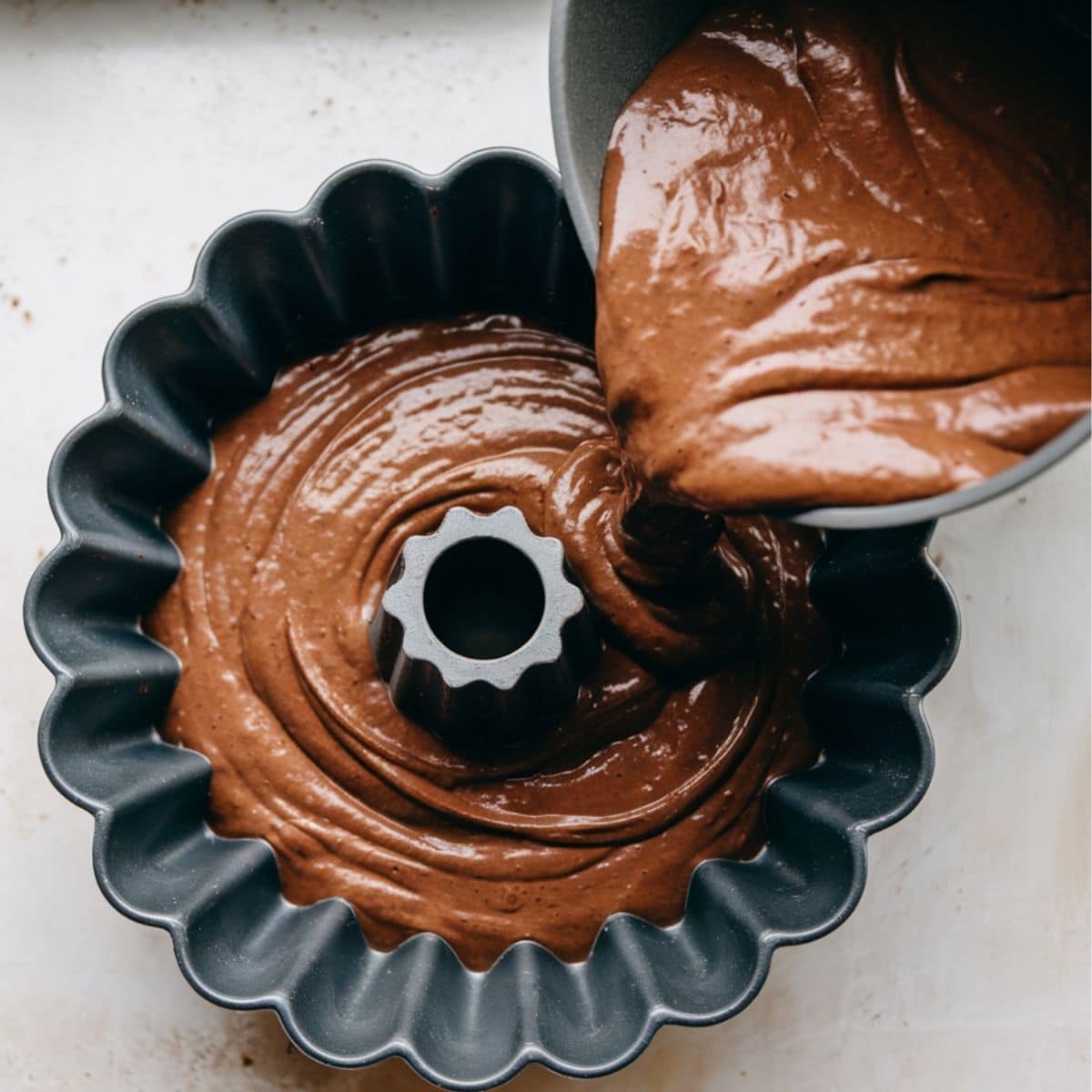 Chocolate bundt cake batter in pan before baking	