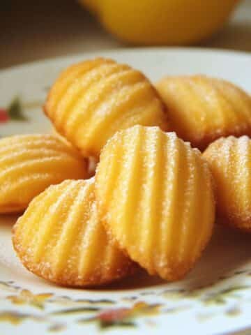 Close-up of homemade Lemon Madeleine Recipe on a white kitchen counter