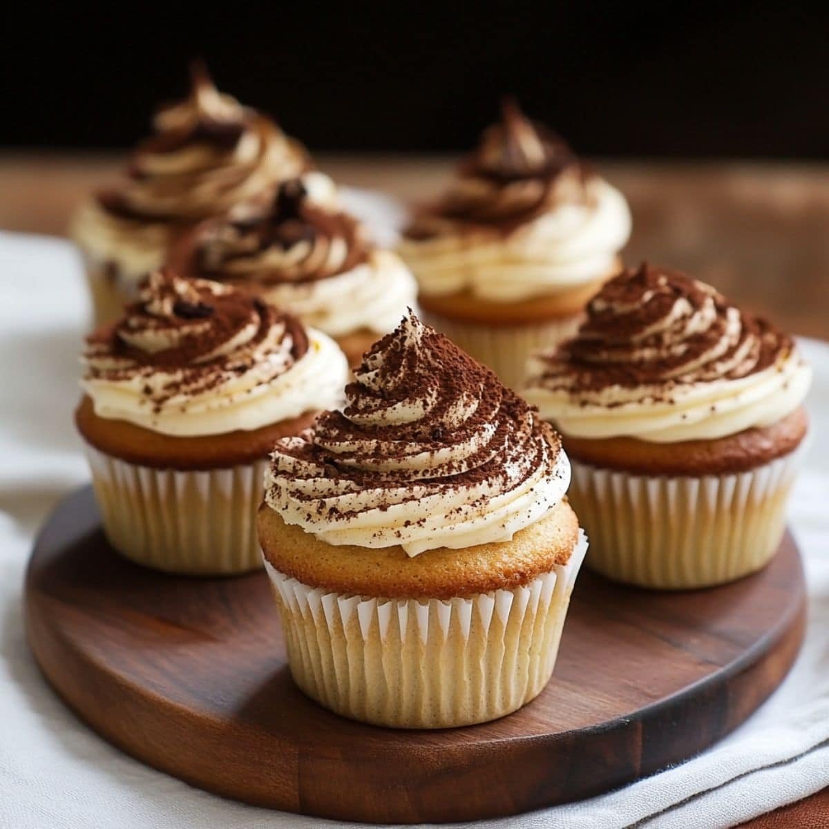 Freshly made Tiramisu Cupcakes Recipe dusted with cocoa powder 