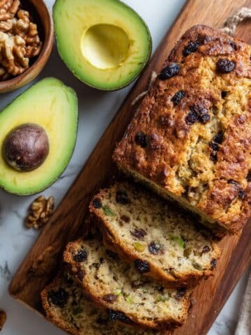 Sliced homemade Avocado Bread Recipe on a wooden board