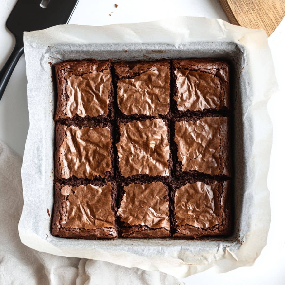 Freshly baked gluten-free brownies cooling in pan