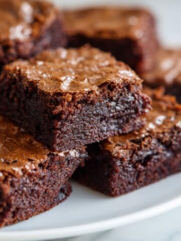 Fudgy vegan brownies freshly cut and ready to serve