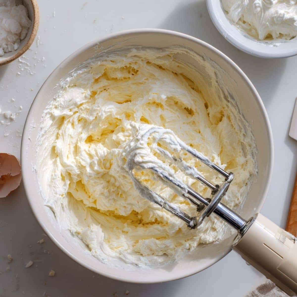 Whipping cream cheese with sweetener and folding in whipped cream	