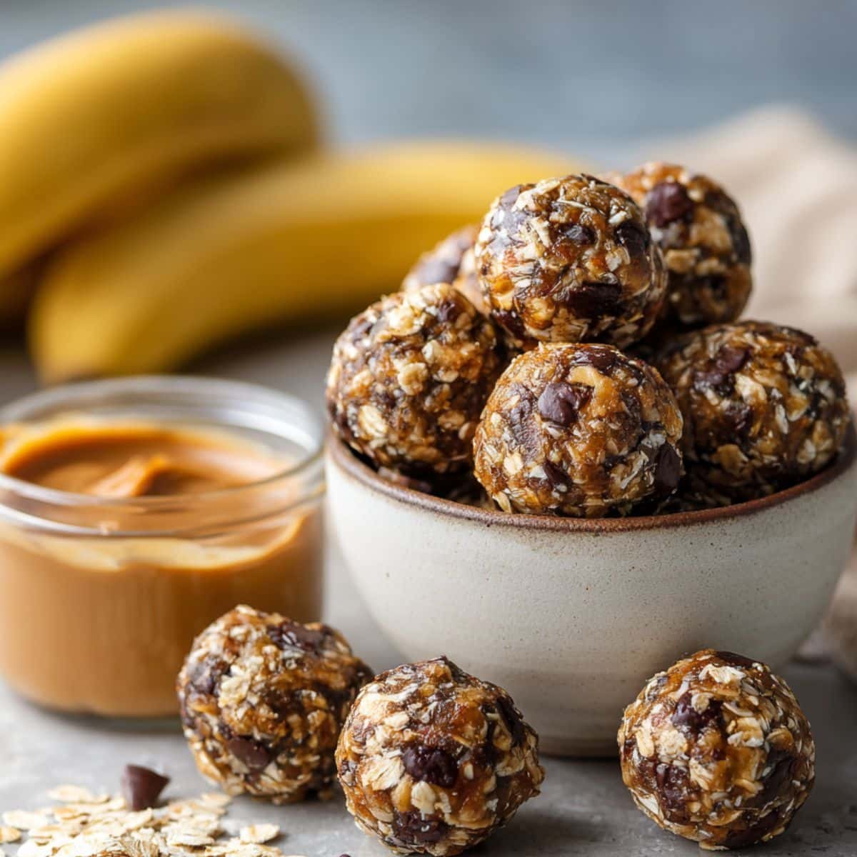 Homemade banana energy bites on a white counter	