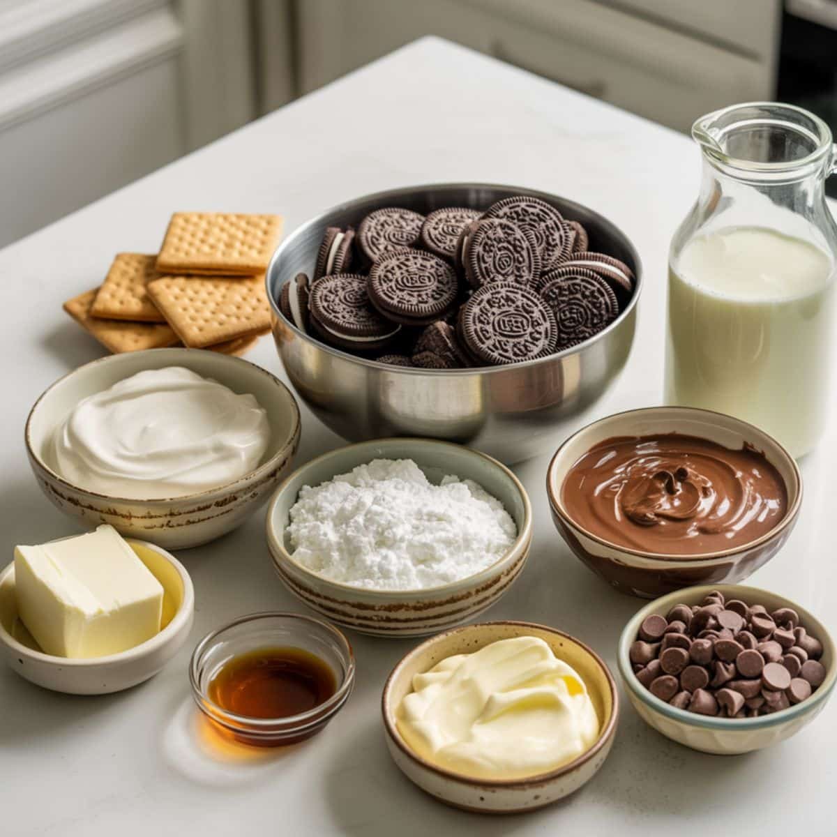 All ingredients for chocolate lasagna on white counter	