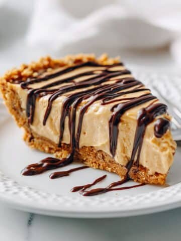 Slice of no bake peanut butter cheesecake on a plate