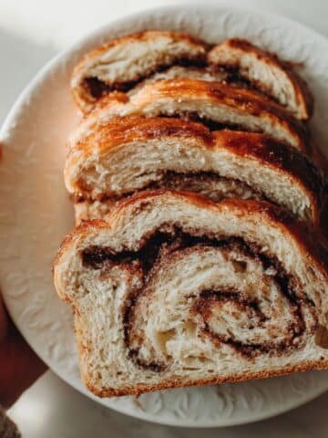 Rustic sourdough cinnamon bread loaf with visible swirls