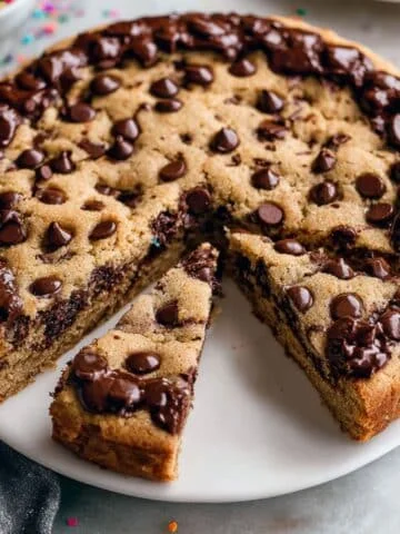 Giant chocolate chip cookie cake sliced