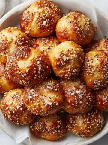 Homemade sourdough pretzel bites sprinkled with coarse salt and seasoning