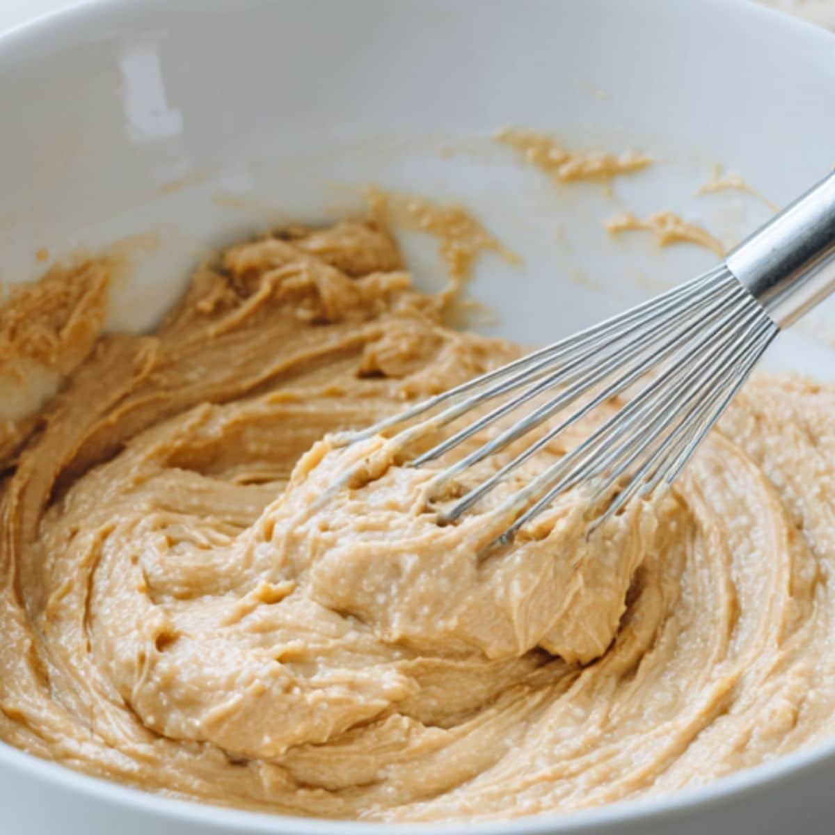 Mashing banana and mixing wet ingredients