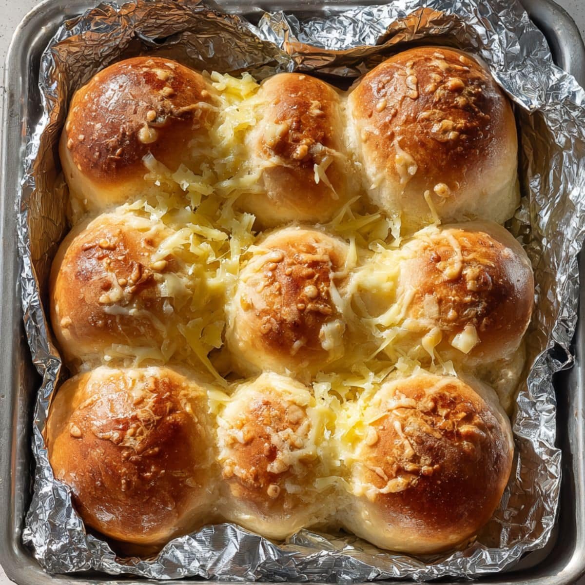 Baking garlic bread covered with foil	
