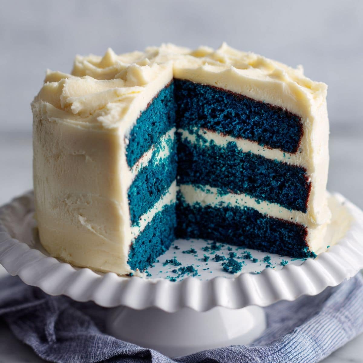 Three-layer blue velvet cake with cream cheese frosting	