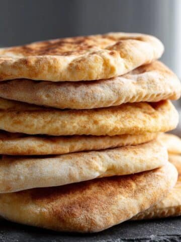 Stack of gluten free pita bread on counter