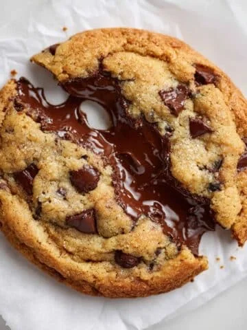 Gooey Nutella-filled cookie being pulled apart