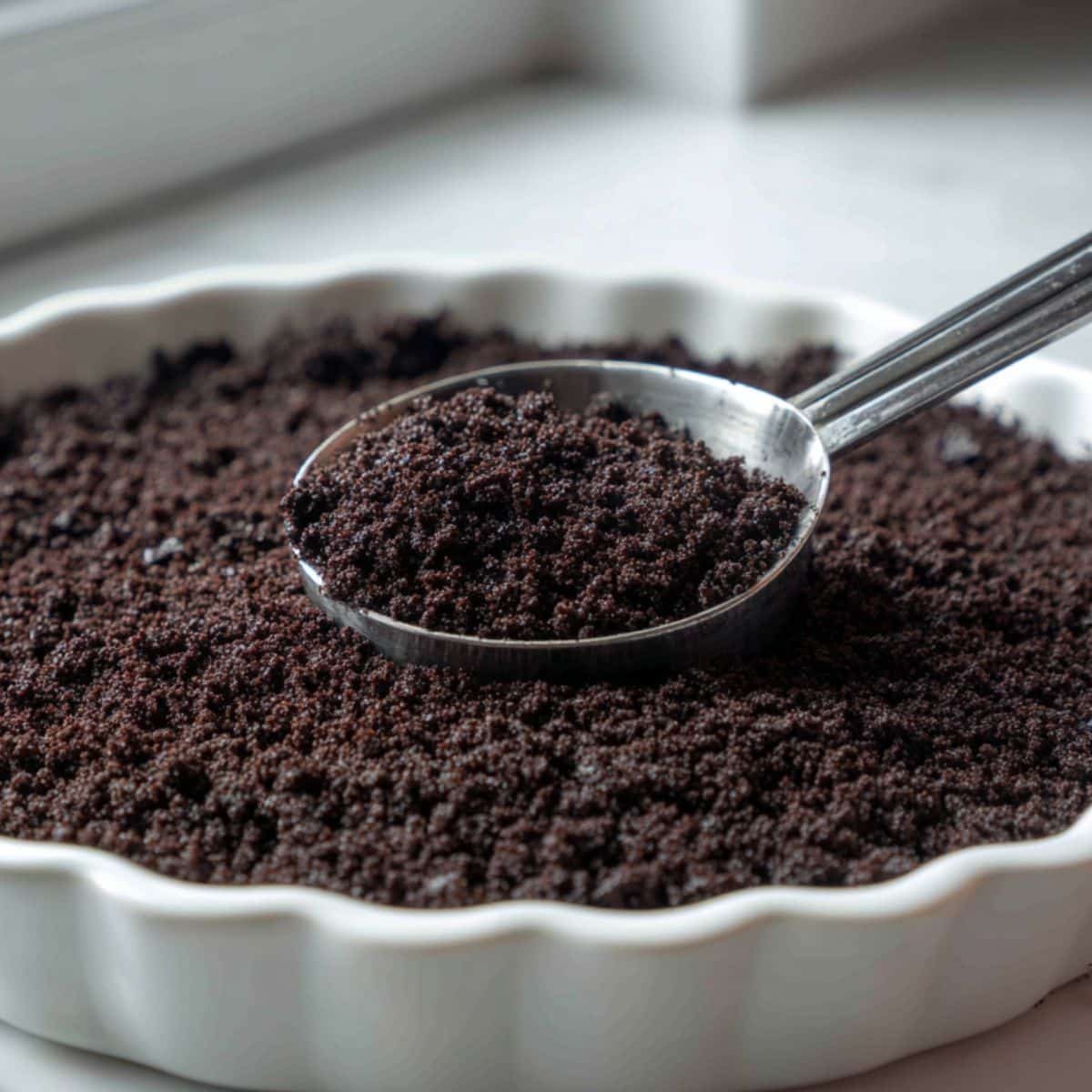 Whisking chocolate coffee ice cream base for Mississippi mud pie ice cream	