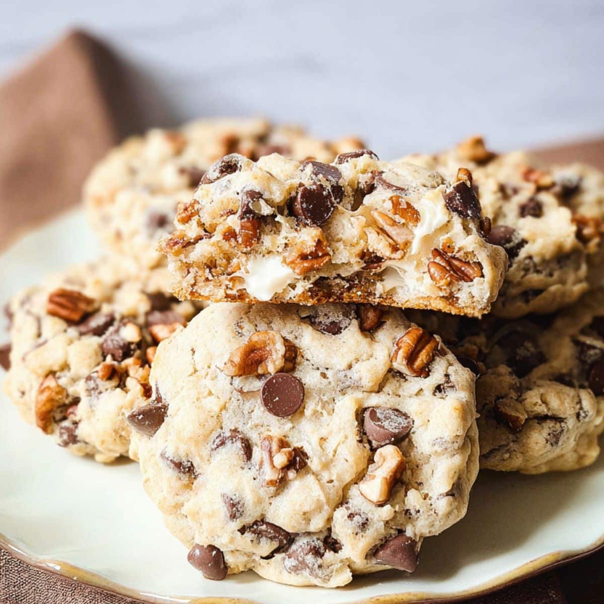 homemade forgotten cookies with chocolate chips on parchment on a white kitchen table.