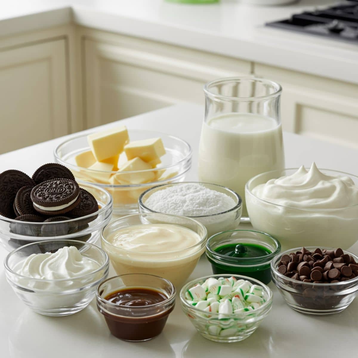 Chocolate mint lasagna ingredients on white kitchen table