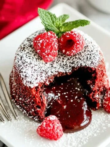 Red velvet lava cake with molten center on white table